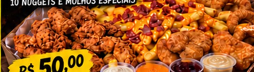 Porção de frango, fritas, anéis de cebola e nuggets